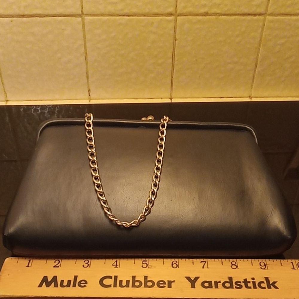Bell Purse. of Calif Navy blue. Top 2.Bottom 5 inches. Vintage.